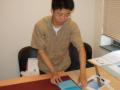 Our design leader measures the different boxes..