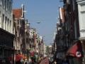A shopping street. Note the funny street lights.