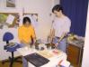Andrea and Juan preparing the chocolate cake