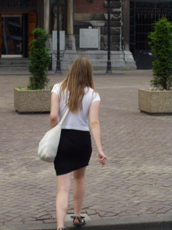 This tourist was decided to visit the museum by herself..