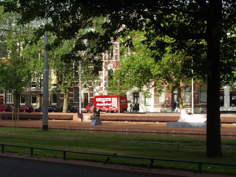 Boulevard decorated with a small lake