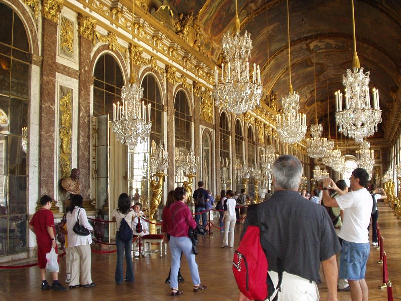 The ceiling is illustrated with the life of Louis XIV.