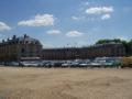 The parking lot and a nearby building