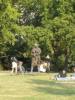 A statue and people